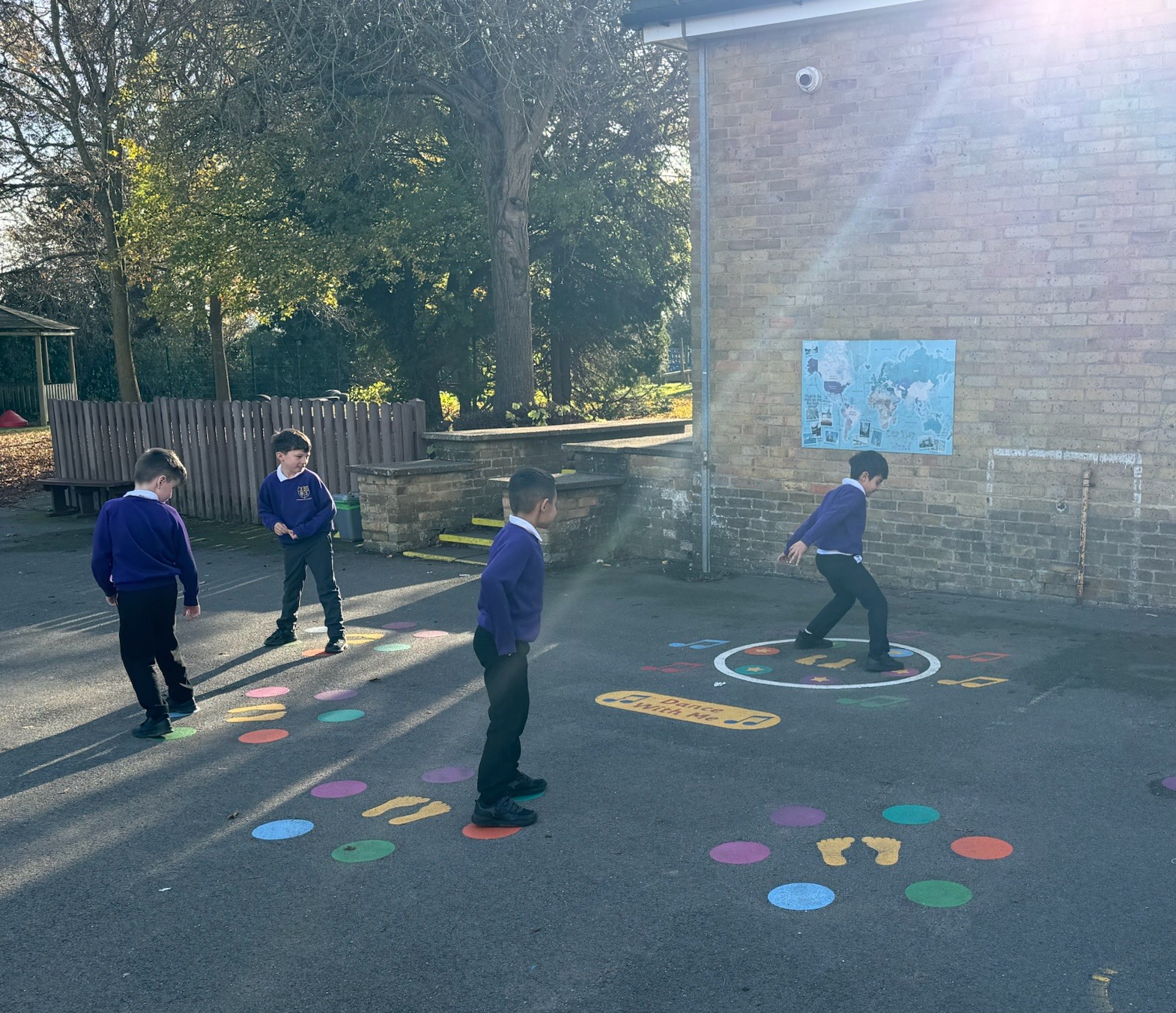 Children playing with playground markings