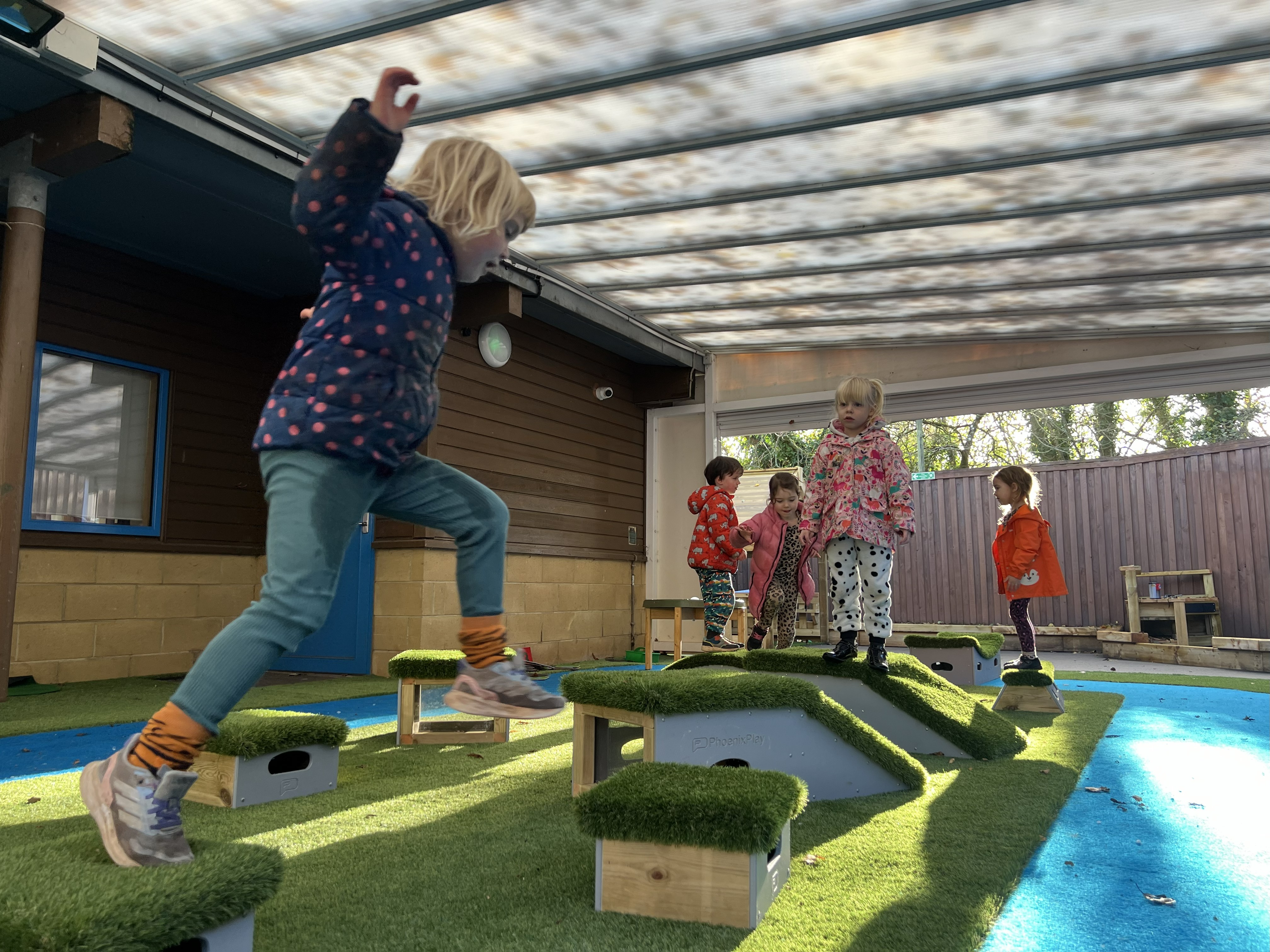 Child jumping on Great Explorer blocks