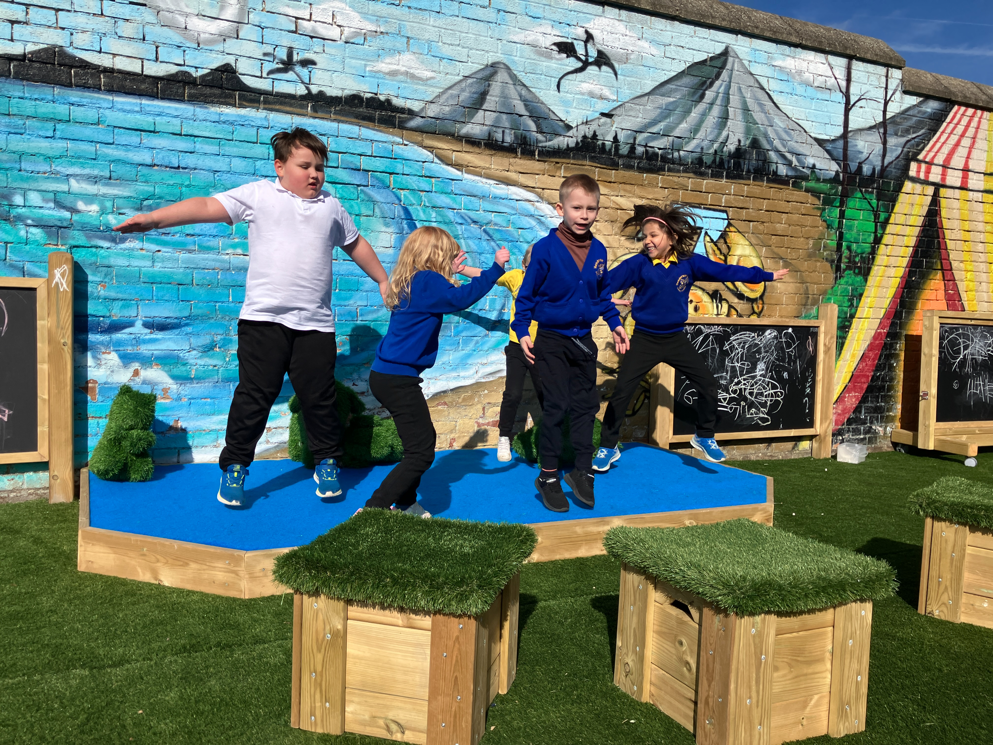 Communication & Language Development: Stage and seating installation at Henderson Green Primary Academy