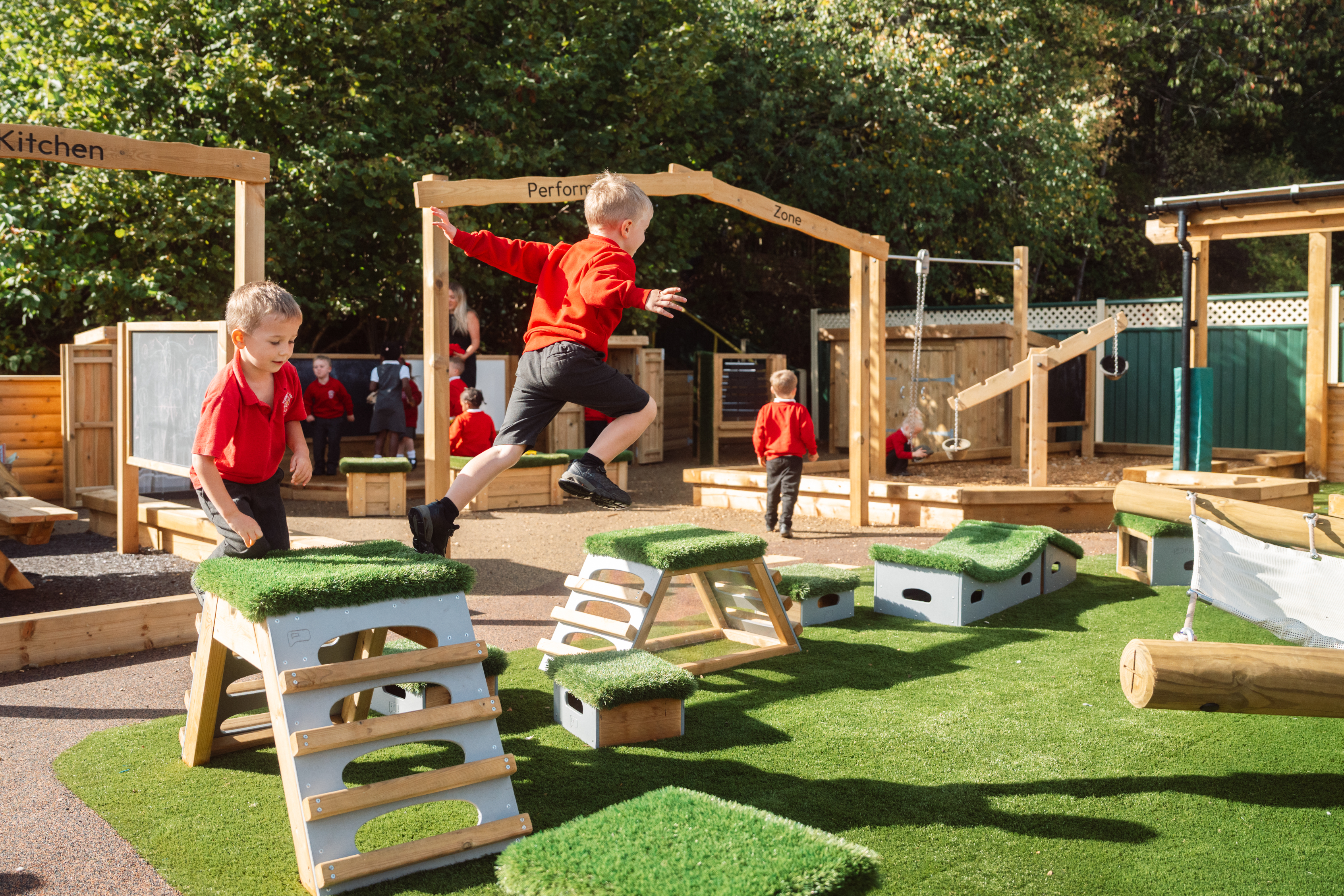 Hunsbury Park play development children playing on play blocks